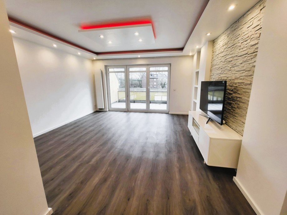 Wohnzimmer mit Lichtkonzept Maisonettewohnung Duisburg